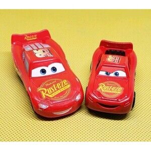 Disney Pixar Cars Lightning McQueen Rust-eze Plastic Car Toy And Rev N Go Mini..